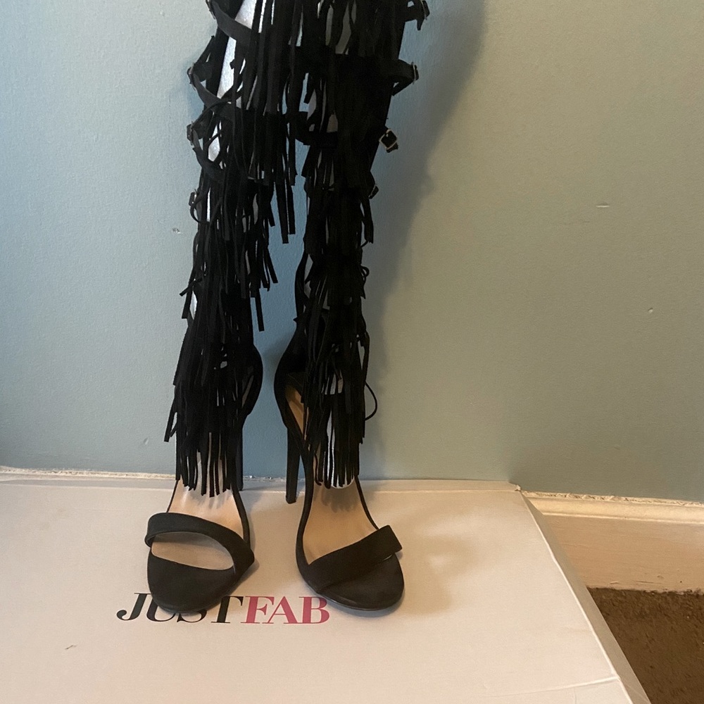 Like-new knee-high sandals